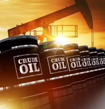 A 3D illustration shows a row of black barrels labeled 'CRUDE OIL' stacked in front of an oil pump jack silhouetted against a bright orange sunset.