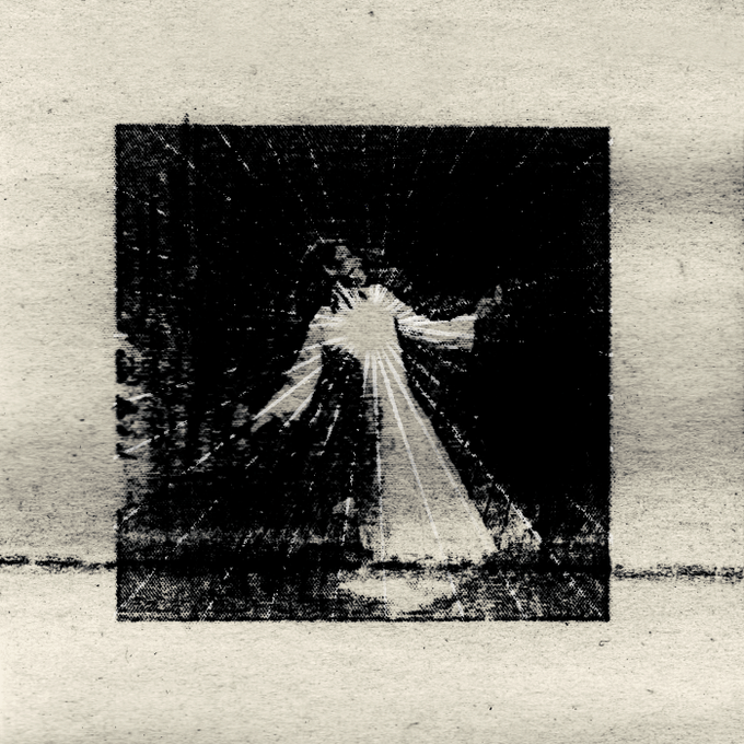A grayscale, textured image features a central square with a luminous starburst or explosion pattern radiating bright rays outward against a dark background.