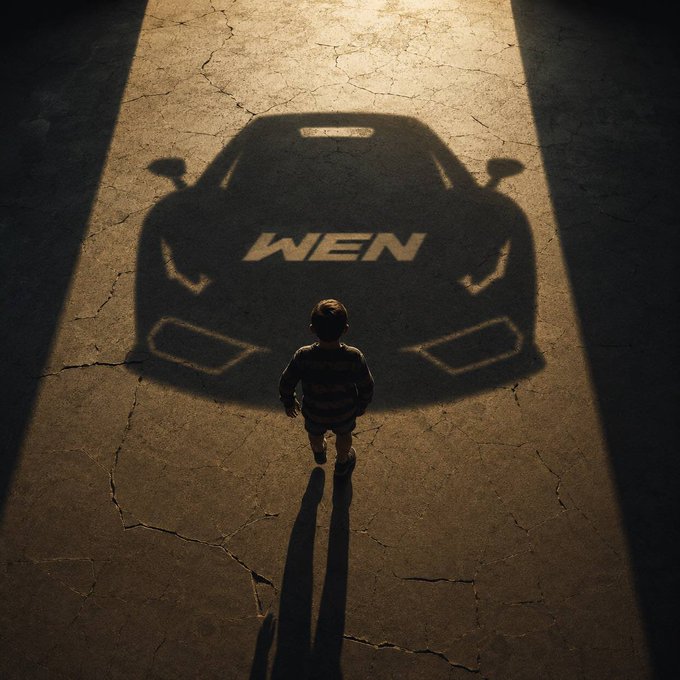 A young boy stands in a beam of light casting a shadow shaped like a sports car with the word "WEN" emblazoned on the hood. The image visualizes the phrase "Every belief system begins with a vision," symbolizing the aspiration of "Wen Lambo?" — the crypto community's dream of achieving wealth that leads to owning a Lamborghini.