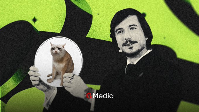 A black-and-white photo of a man holding a circular cutout of a cat against a green graphic background, with a 'Media' logo in the corner.