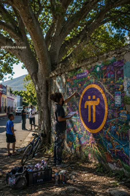 A street art scene showing a person spray-painting a colorful Pi Network mural on a wall, with another Pi Network logo visible and bystanders watching, credited to @PiWeb3Army.