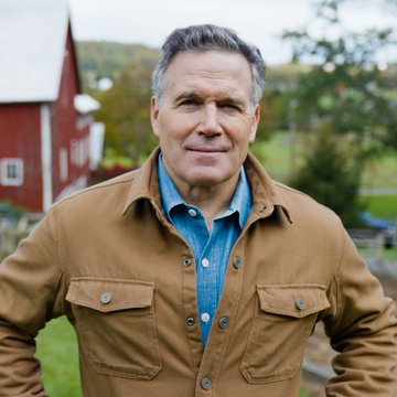 Senator Dave McCormick, seen in a casual outdoor setting, is urging for the swift passage of the CLARITY Act before the August recess, emphasizing the need to know where Democrats stand on the issue.