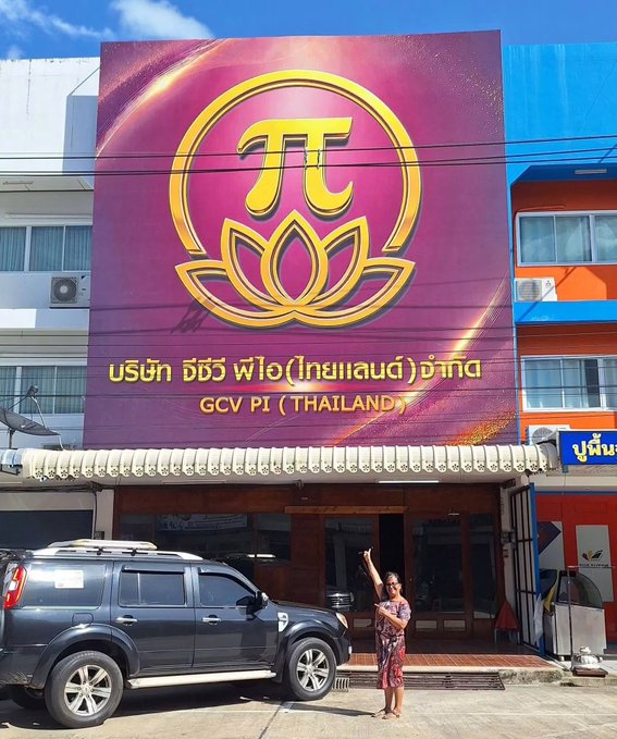 A woman poses in front of the GCV Pi (Thailand) storefront, a vibrant pink and purple sign featuring the Pi cryptocurrency logo and Thai text reading "บริษัท จีซีวี พ่อไอ(ไทยแลนด์) จำกัด," reflecting the post's message about Pi Network's growing community and adoption in Thailand.