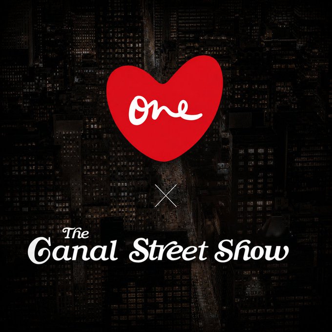 A promotional graphic featuring a red heart with 'one' written inside, set against an aerial cityscape backdrop, with text reading '× The Canal Street Show'.