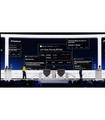 A Bloomberg terminal displaying financial market data, charts, and trading information across multiple monitor screens.