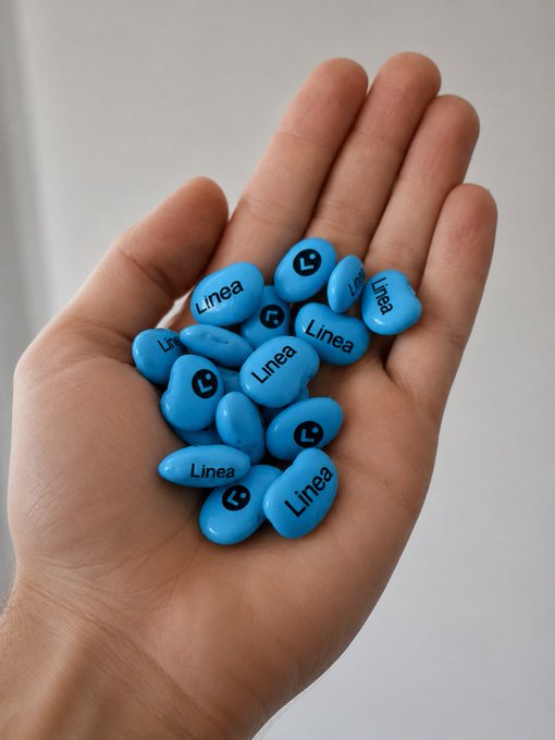 A hand holds light blue jelly beans labeled "Linea," visually symbolizing the hidden potential of the $LINEA token. The "beans" imagery cleverly ties to the post's metaphor of secrets being "spilled," suggesting that once $LINEA's true nature is revealed, it could ignite a super-cycle.