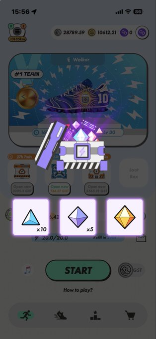 A mobile game screen showing a reward or loot box animation with crystals and a 'START' button at the bottom.