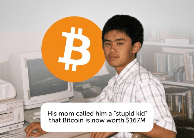 A young man sits at a desk in front of a vintage Samsung computer, with a large Bitcoin logo overlay and the caption "His mom called him a 'stupid kid' that Bitcoin is now worth $167M," referencing CZ (Changpeng Zhao), the founder of Binance.