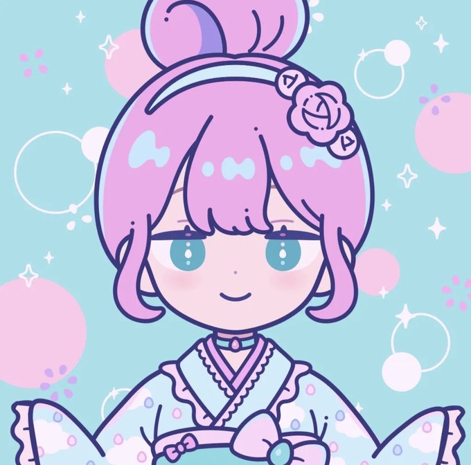 An anime-style chibi illustration of a girl with pink hair in a bun, wearing a pastel kimono and a rose hair accessory against a sparkly blue and pink background.