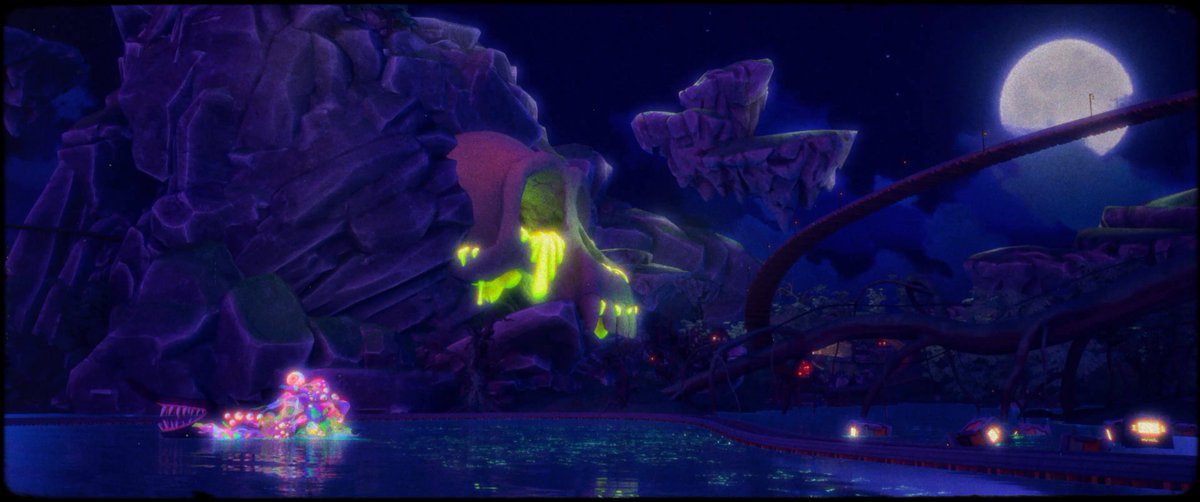 The image features a large, purple rock formation with green glowing elements that appear to be inhabited by a group of mutant apes. These apes are seen lounging around the rocks, creating an atmosphere reminiscent of a tropical island or jungle setting. The scene is set against a dark night sky and a full moon, adding to the overall ambiance of the image. The caption "Mutant Ape Yacht Club" suggests that this unique rock formation might be part of a themed event or attraction at a resort or theme park.