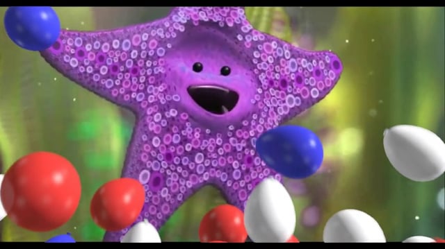A cheerful purple starfish with a wide smile is surrounded by a scattering of red, white, and blue balls against a vibrant green background. The celebratory imagery perfectly matches the excitement and bullish energy conveyed in the caption celebrating "TODAY'S THE DAAAAAAAAY," evoking enthusiasm for a long-awaited milestone moment.