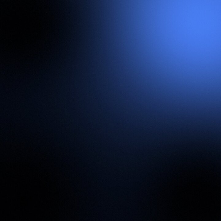 The image shows a dark blue background, possibly a night sky or a deep ocean, with a bright light shining through it. The focus of the image is on this bright light, which stands out against the darkness. There are no texts or other objects in the image, and the relative position of the light to the background suggests that it is located at the center of the frame.