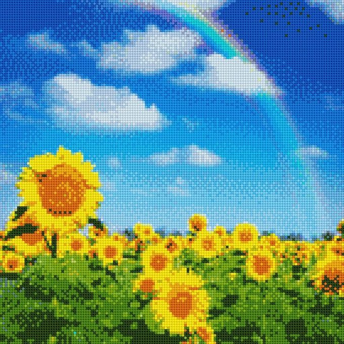 A pixelated, diamond-painting style artwork depicting a vibrant field of yellow sunflowers under a blue sky with fluffy white clouds and a rainbow arching overhead.
