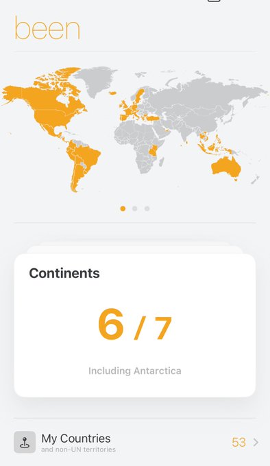 A travel tracking app shows the user has visited 6/7 continents (including Antarctica) and 53 countries, with a world map highlighting visited regions in orange—tying into the post's invitation to join a trip to Antarctica as the final unexplored continent.