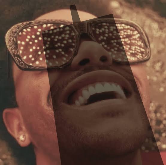A man with studded sunglasses and a diamond earring smiles upward at the sky, overlaid with a glowing "M" letter, visually representing the "next stop: Mars" sentiment tied to $Marscoin and the anticipation of a major green price candle.