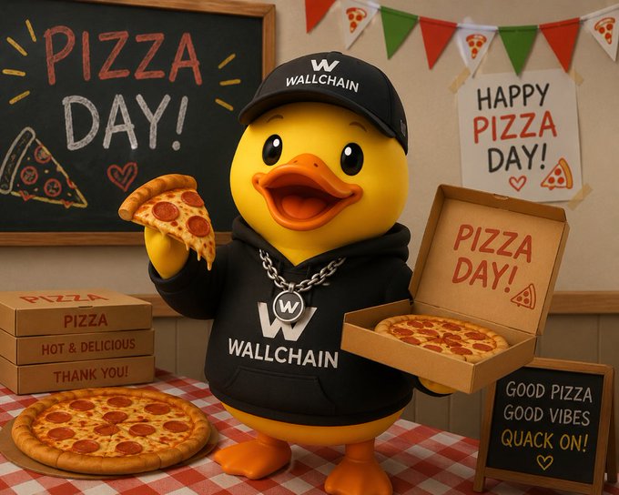 iced duck mascot holds a slice of pizza, wearing a black hoodie and "Wallchain" t-shirt with "W" on it.