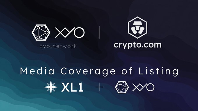 A promotional graphic on a dark blue gradient background announces the Crypto.com listing of XYO tokens, featuring both the XYO Network and Crypto.com logos at the top, with the headline "Media Coverage of Listing" displayed alongside the XL1 and XYO token symbols connected by a plus sign. The image aligns with the post by visually confirming Crypto.com's support for XYO custody and trading, reinforcing the message about accessible distribution paths for new buyers.