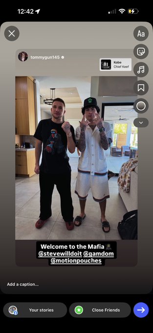 The image shows an Instagram Story posted by @tommygun145 featuring a photo of two men posing indoors—one in a black graphic tee and the other in a white jersey and green bucket hat. The caption reads "Welcome to the Mafia 💰 @stevewilldoit @gamdom @motionpouches," visually supporting the post's claims about Steve Willdoit's business connections and his new high-paying deals with Gamdom and Motion Pouches.
