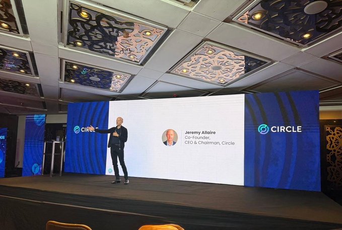 Jeremy Allaire, Co-Founder, CEO & Chairman of Circle, stands on stage presenting at Circle's Buenos Aires event, with his name and title displayed on the large screen behind him, aligning with the post highlighting his vision for Latin American stablecoin adoption and Argentina's role in the future of digital finance.
