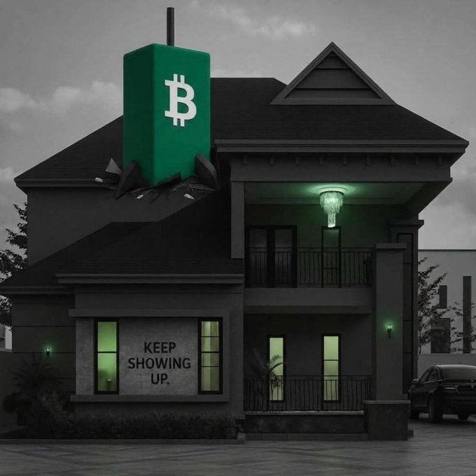 A dark, moody image shows a house with a large green Bitcoin logo emerging from the roof, and the words 'KEEP SHOWING UP.' displayed on the front window.