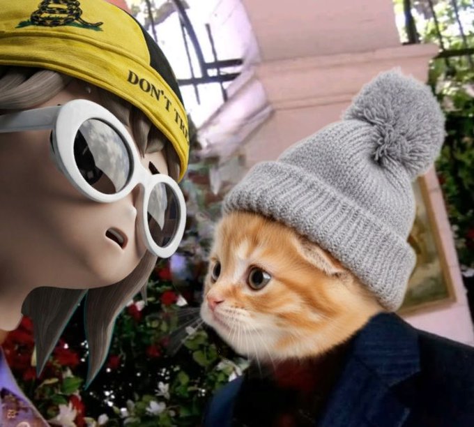 Surreal composite image featuring a 3D animated character wearing a yellow 'DON'T T...' Gadsden cap and white round sunglasses next to an orange tabby cat wearing a grey knit beanie.