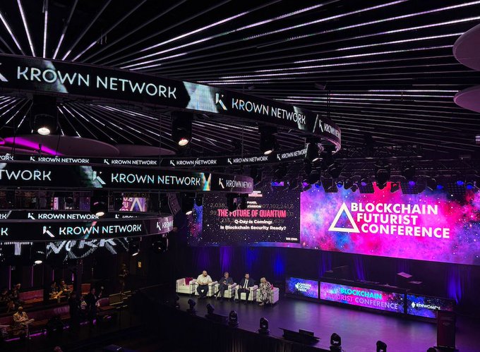 A stage setup at the Blockchain Futurist Conference featuring a panel discussion titled "The Future of Quantum: Q-Day is Coming - Is Blockchain Security Ready?" with Krown Network branding displayed prominently.