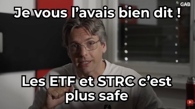 A man wearing glasses points at the camera with French text overlay reading "Je vous l'avais bien dit !" and "Les ETF et STRC c'est plus safe," suggesting skepticism toward crypto security and a preference for ETF and STRC investments over self-custody solutions like ColdCard wallets.