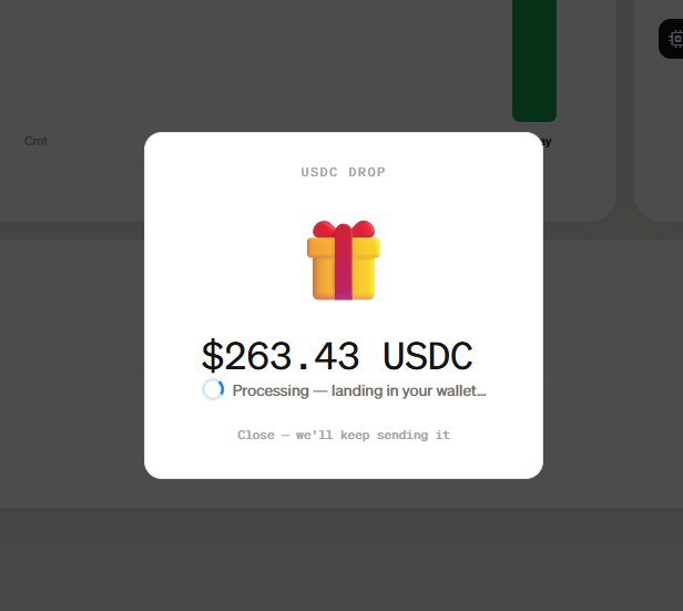 A "USDC DROP" notification pops up showing a gift box icon with the amount "$263.43 USDC" being processed and landing in a wallet, reflecting the context of receiving an unexpected crypto tip or airdrop.