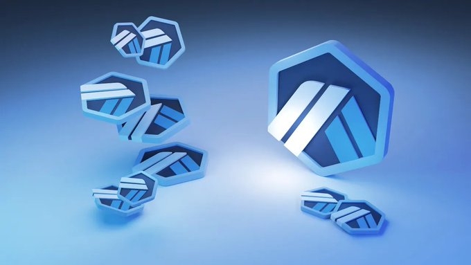A 3D illustration of blue and silver hexagonal cryptocurrency tokens floating against a gradient blue background.
