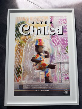 Framed poster for 'ULTRA Chilled' music festival at The Kingcharly, Miami, dated July 2026, featuring a colorful character sitting in a bubble.