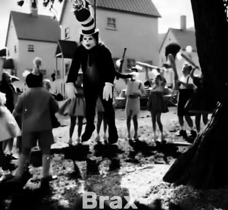 A black-and-white image showing a person in a clown costume with a tall striped hat, white face makeup, and oversized dark clothing, standing in a yard surrounded by children who appear to be running or playing, with houses and a tree in the background; the word "Brax" is visible at the bottom of the image. The unsettling scene of children surrounding a creepy clown captures the chaotic, overwhelming feeling described in the post about being overwhelmed by activity in the order books this week.