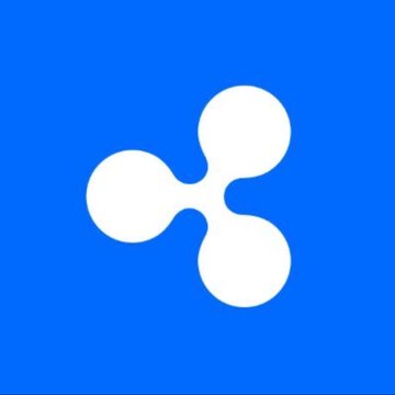 The image features a white Ripple logo, which consists of three circles stacked vertically against each other with a horizontal line running through them. The background color of the image is blue. Below the Ripple logo, there's text that reads "Just In: @Ripple Partners With CME Group as 24/7 Crypto Futures Trading Goes Live." This information suggests that the Ripple cryptocurrency platform has recently launched its trading service and is now available for use by anyone with an internet connection.