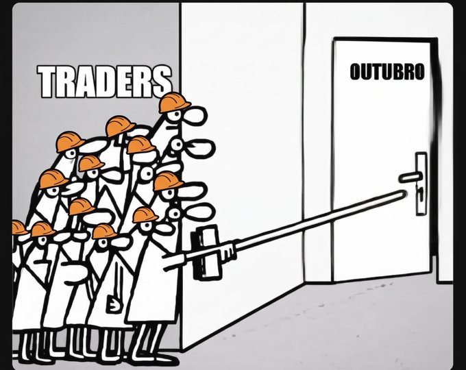 A group of stick figures labeled "TRADERS" wearing hard hats stand together, reaching toward a door marked "OUTUBRO" (October in Portuguese) with a long pole, symbolizing traders anxiously anticipating and trying to unlock the October market—aligning with the post's "Are you ready?" prompt about upcoming market action.