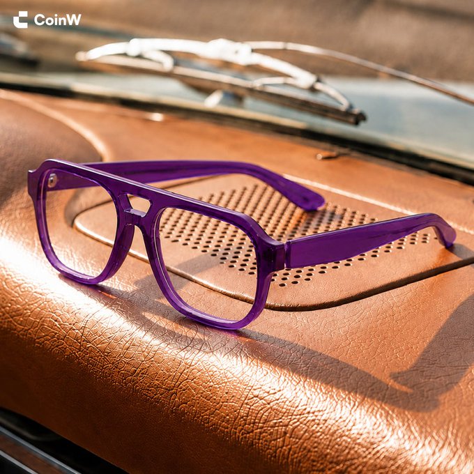 Purple-framed glasses rest on the tan leather dashboard of a vintage car, serving as the "x1000 gems detector" referenced in the post. The "CoinW" logo is visible in the top-left corner, tying the scene to the crypto platform's branding.