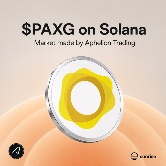 A promotional graphic announcing "$PAXG on Solana" with the tagline "Market made by Aphelion Trading," featuring a silver medallion displaying a yellow Solana-style emblem on a peach gradient background, with logos for Aphelion and Sunrise at the bottom.