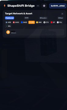 A mobile screenshot of the 'ShapeShift Bridge' application showing a 'Target Network & Asset' selection menu with options like 'Fantom' and 'SOL'.