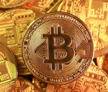 The image features a close-up view of a gold coin with the Bitcoin symbol, which is a digital currency that has gained significant attention recently due to its potential impact on the global economy. The coin's value is highlighted by the fact that it is made of real gold and is shiny in color. The post discussing Bitcoin savings suggests that people should consider investing in Bitcoin instead of traditional forms of wealth accumulation like real estate, as it could help younger generations afford homes more easily. This viewpoint emphasizes the potential benefits of digital currency and its ability to disrupt conventional financial systems.