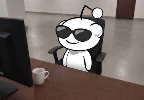A cartoon panda wearing sunglasses sits in an office chair at a desk with a computer monitor and a white mug.