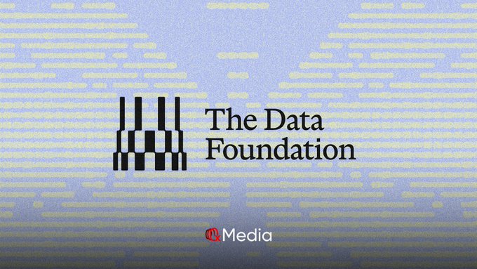 The image displays the logo and name "The Data Foundation" alongside the "Media" branding, set against a light blue pixelated background. This visually represents Story's rebranding to "The Data Foundation," reflecting the project's strategic shift away from its earlier focus on on-chain IP for music, games, and images toward a broader data-centric identity.