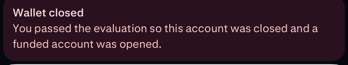 A dark red notification banner reads "Wallet closed: You passed the evaluation so this account was closed and a funded account was opened," announcing the trader's successful completion of a prop firm evaluation and transition to funded trading status in preparation for next month's leaderboard push.