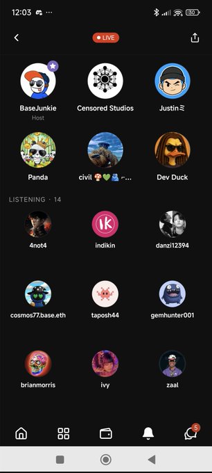 The image shows a phone screen displaying various social media apps with icons representing different types of content such as music, movies, and photos. The main app being displayed is a music app that has a large number of users and a diverse range of songs available for listening. The background color of the image is black, which contrasts with the white text on the screen.