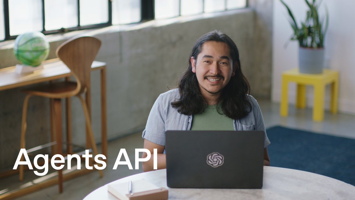 The image shows a smiling man with long dark hair sitting at a round table with an OpenAI-branded laptop, with the text "Agents API" overlaid in the lower left corner. The image relates to the post by visually highlighting OpenAI's Agents API in a relatable developer/tech context, while the post addresses a key limitation of that API—lack of persistent context—and promotes Walrus Memory as a cross-session, cross-platform solution.