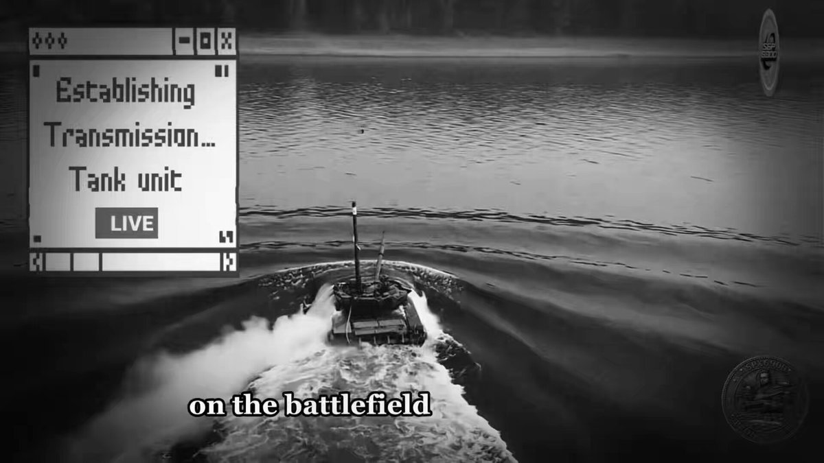 The image shows a tank driving through water, with the words "Establishing Transmission - Tank Unit Live" written above it. The text also includes an image of a tank on the water.
