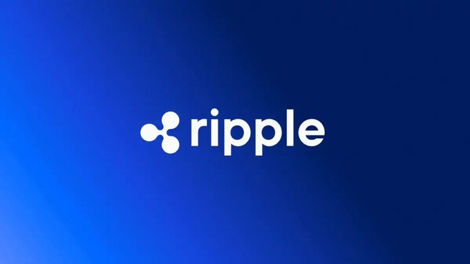 The image features a blue background with white text that reads "ripple". Below the text, there's an image of a coin symbol, which is the logo for Ripple cryptocurrency. The caption below the image states that Ripple is being used as a payment method by Mastercard.