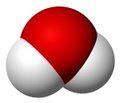 A simple 3D illustration of a pill capsule, half red and half white.