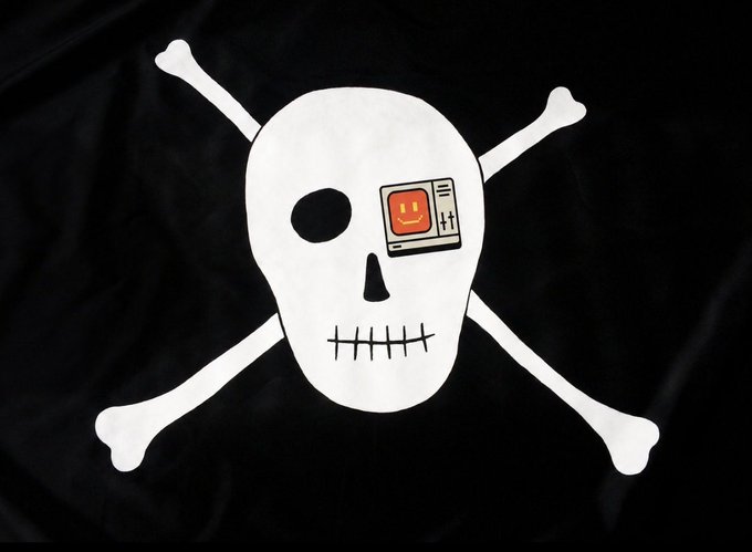 A graphic of a white skull and crossbones on a black background, with a retro computer displaying a smiley face in place of one eye.
