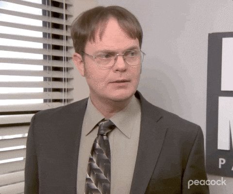 The image features a man dressed in a suit, wearing glasses and a tie. He appears to be looking off into the distance or at someone else who isn't visible in the frame. The caption for this image reads "Next up $Neo and $XLM". This suggests that there might be an upcoming series of TV shows featuring the character $Neo from the show $XLM, which is a popular animated series known for its unique characters and storytelling style.