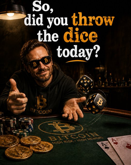A man wearing Bitcoin-branded sunglasses and a hoodie gives a thumbs-up at a casino table featuring Bitcoin-logo dice, chips, and coins, with the text "So, did you throw the dice today?" and "BITCOIN HIGH RISK · HIGH REWARD" visible. The image cleverly ties to the "throw dice to reduce risk" caption by framing Bitcoin investing as a gamble where embracing volatility (the dice) is the smarter contrarian play.