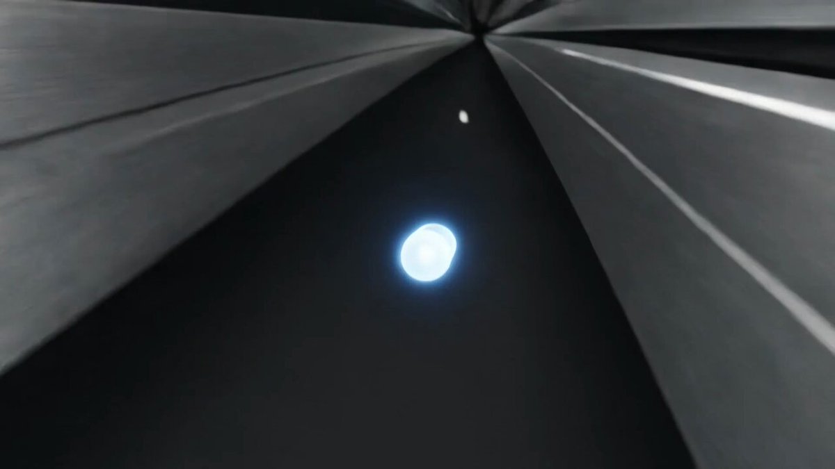 The image shows a close-up view of a white lightbulb floating in space against a black background. The lightbulb appears to be glowing with an ethereal blue hue, creating a sense of wonder and mystery. The image also contains text that reads "Hackers don't need the whole system - just its weakest point. One key. One wallet. One server." This message seems to be related to the concept of vulnerability in computer systems or networks.