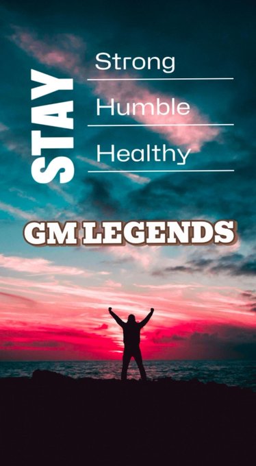 A motivational poster with the text "STAY Strong Humble Healthy" and "GM LEGENDS" displayed over a silhouette of a person with raised arms against a vibrant sunset sky.